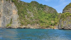 Hills and cliffs rising up around the Phuket Sea